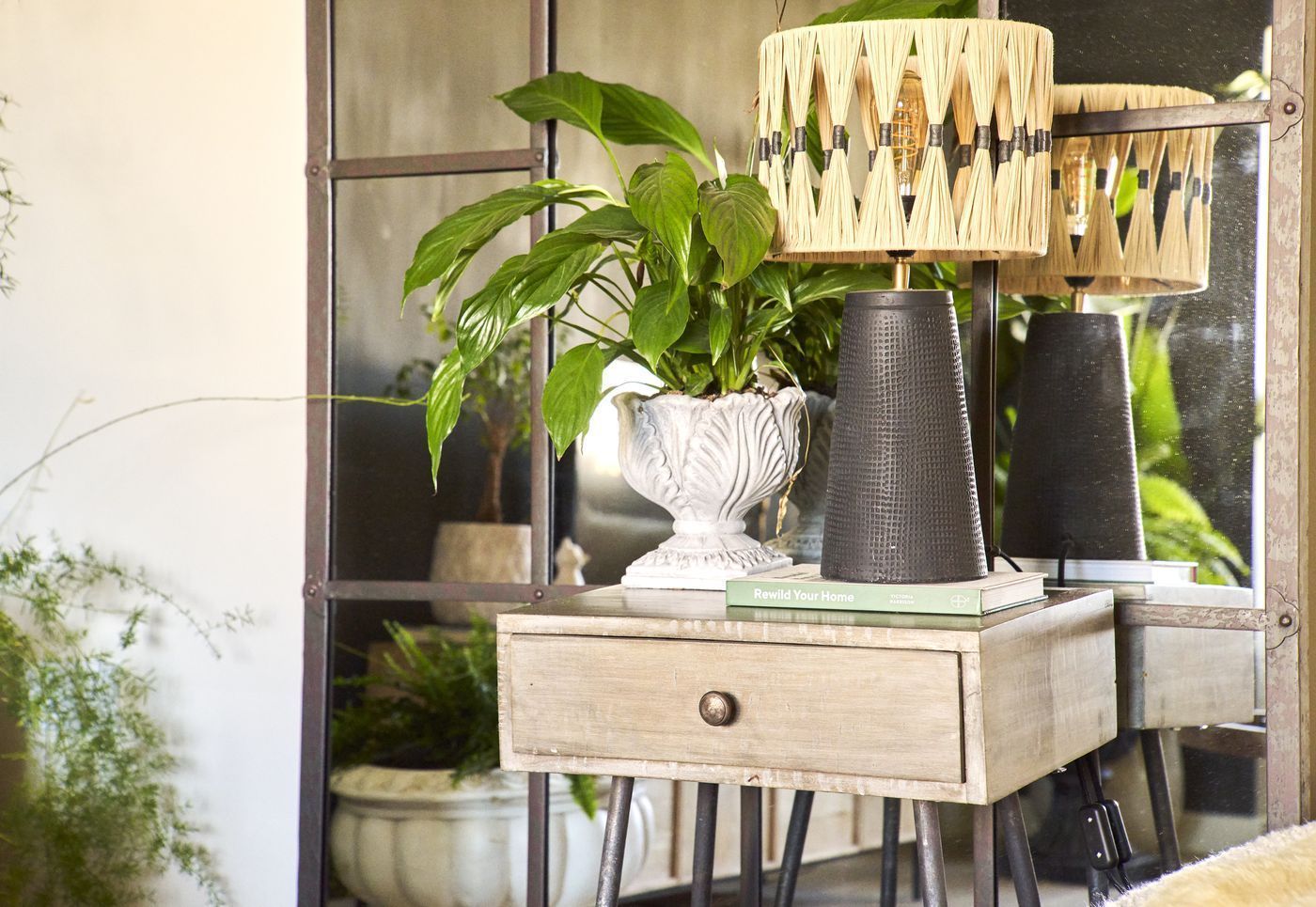 Warm layered ambient lighting with woven rattan textures and golden glow